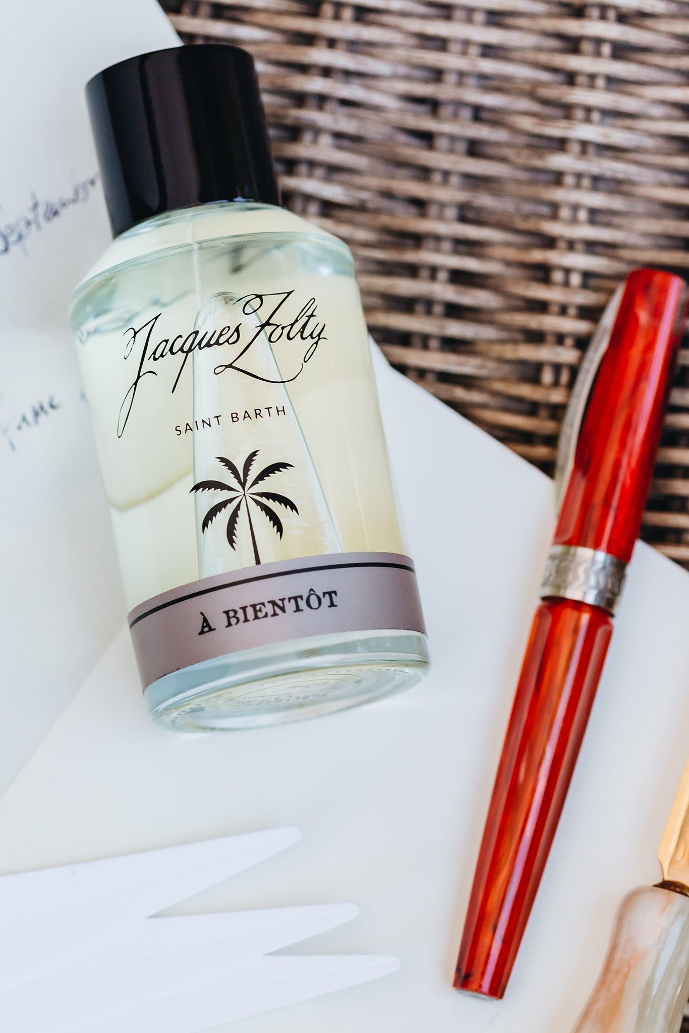 À Bientôt fragrance bottle in island light